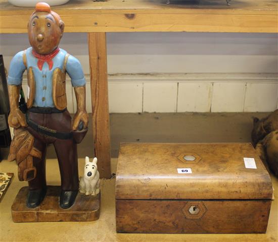 Carved model of Tin Tin and a walnut writing slope